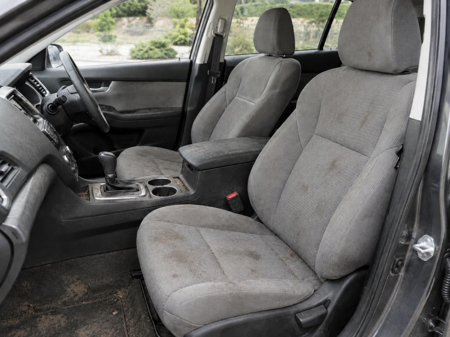 Front seats and console, before